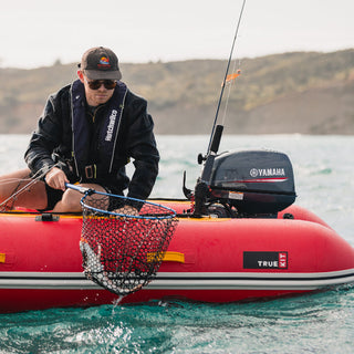 Fishing from a True Kit Discovery landing craft inflatable catamaran
