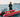 An angler fishing while standing on his inflatable boat