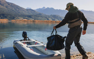 A man getting ready to sail with his tactician