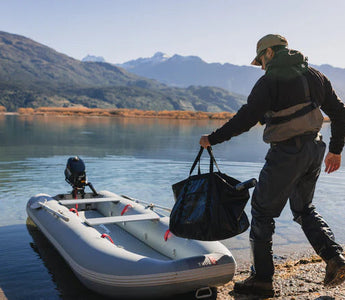 A man getting ready to sail with his tactician