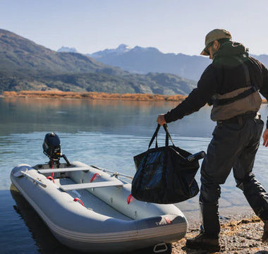 A man getting ready to sail with his tactician