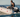 A boater on sail with his Electric Outboard Motor-Powered True Kit Navigator 