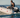 A boater on sail with his Electric Outboard Motor-Powered True Kit Navigator 