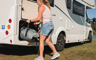 The compact True Kit inflatable coming out of a motorhome/RV