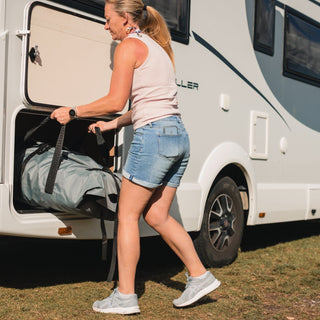 The compact True Kit inflatable coming out of a motorhome/RV